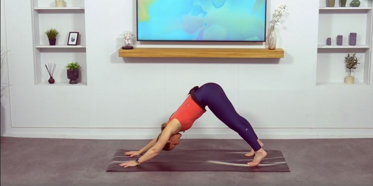 Georgina demonstrating a standing mobility exercise